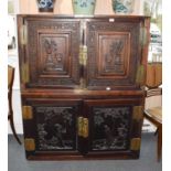 A Chinese Padouk Wood and Brass Bound Cabinet, in two sections, the upper section with moulded