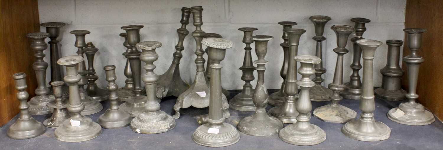 A Quantity of Various Antique Pewter Candlesticks (qty)