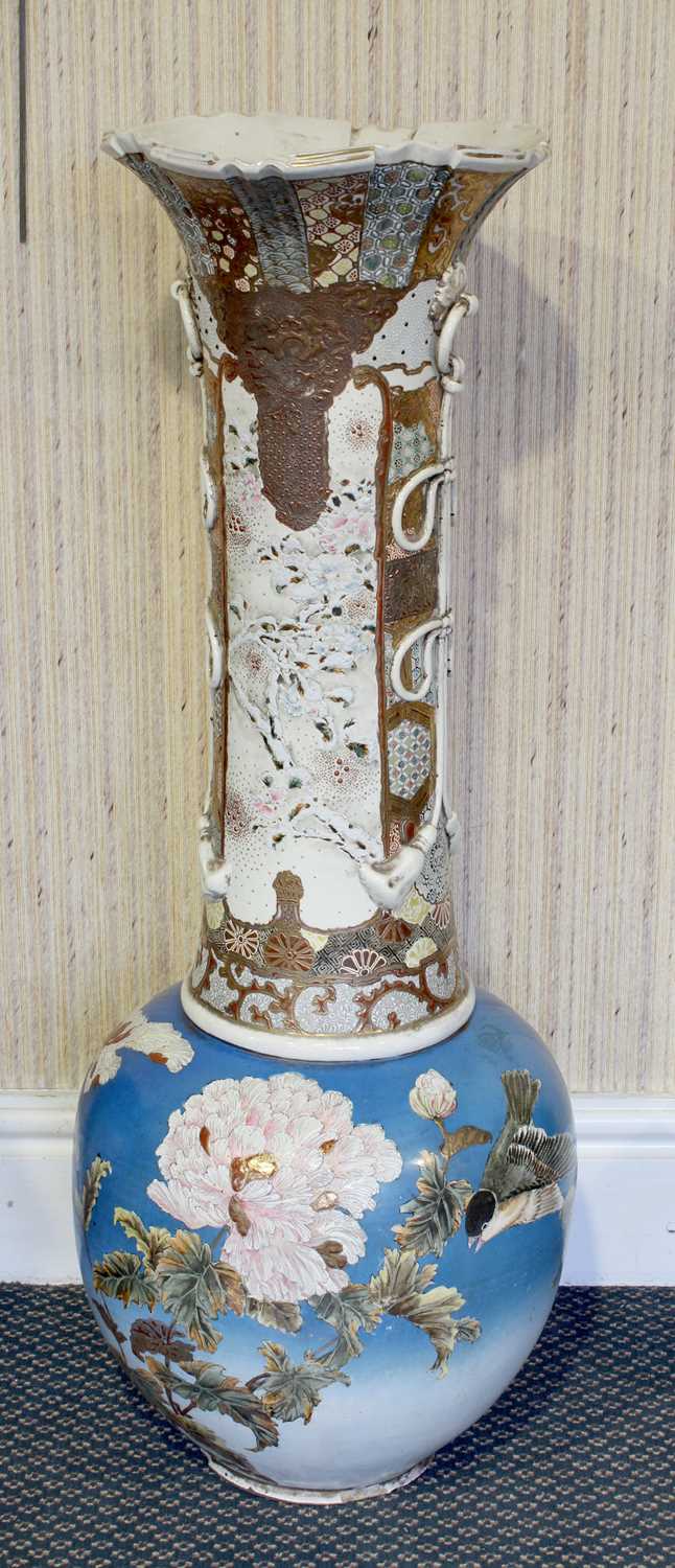A Japanese Satsuma-Style Earthenware Vase, circa 1900, the trumpet neck with foliage on a brocade