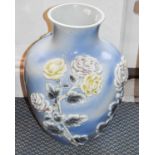 A Japanese Porcelain Vase, 1st half 20th century, of ovoid form, moulded and painted with