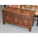 An Early 20th Century Carved Oak Three Panel Coffer, 108cm by 42cm by 58cm