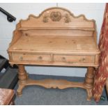 A Victorian Pine Dressing Table, with upstand and two drawers, raised on turned baluster supports