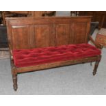 An 18th Century Oak Four Panelled Settle, 153cm by 53cm by 100cmOriginal seating replaced with
