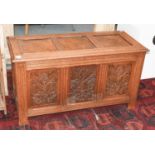 A 20th Century Carved Oak Three Panel Coffer, 116cm by 52cm by 63cmGood clean condition. Key