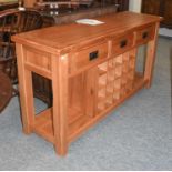 A Modern Oak Three Drawer Sideboard, with removable wine rack and shelf stretcher, 150cm by 45cm