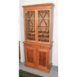 A Pine Bookcase, 19th century, with glazed upper section, 82cm by 41cm by 185cm