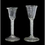 A Wine Glass, circa 1750, the rounded funnel bowl on a mixed air twist stem and folded foot17cm