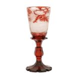 A Bohemian Ruby Overlay Clear Glass Goblet Vase, 19th century, the rounded funnel bowl engraved with