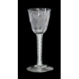 A Jacobite Wine Glass, circa 1750, the rounded funnel bowl engraved with a rose and butterfly on