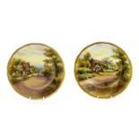 A Pair of Royal Worcester Porcelain Plates, by Raymond Rushton, 1938, painted with views of "