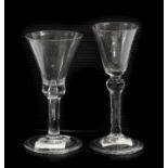 A Wine Glass, circa 1740, the rounded funnel bowl on a ball knop plain stem and folded foot15.5cm