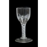 A Mixed Twist Wine Glass, circa 1750, to ovoid bowl on an opaque twist stem with central air