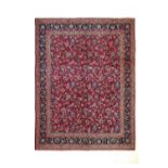 Mashad CarpetNorth East Iran, circa 1960The raspberry field with an all over design of plamettes and