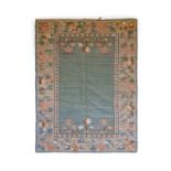 Bessarabian KilimEastern European, early 20th centuryThe plain pastel-green field with stylised