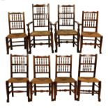 A Harlequin Set of Eight (6+2) Lancashire Ash Spindle-Back and Rush-Seat Dining Chairs, the