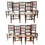 A Harlequin Set of Twelve Mid 19th Century Rush-Seated Dining Chairs, the singles with double