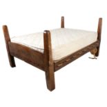 An Early 18th Century Three-Quarter Bedstead, of pegged construction and rope base, the modern