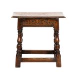 A 17th Century Style Oak Joint Stool, late 19th/early 20th century, the pegged top above a carved