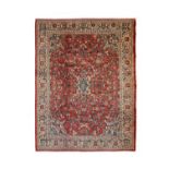 Mahal CarpetWest Iran, circa 1950The faded strawberry field of vines centred by an ivory medallion