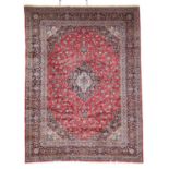 Large Kashan Carpet Central Iran, circa 1970 The crimson field of palmettes and vines around an