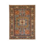 Afghan Rug of Karachov Design, circa 1990The field centred by a large octagon framed by four