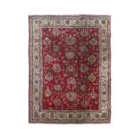 Tabriz CarpetNorth West Iran, circa 1950The crimson field with an allover design of large