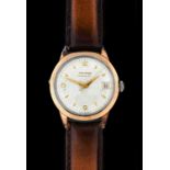 Movado: A Gold Capped and Steel Automatic Calendar Centre Seconds Wristwatch, signed Movado, 1950's,