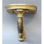 A Giltwood Wall Bracket, the 18th century acanthus leaf carved arm supporting a later top, (platform