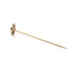 A Diamond Three Stone Stickpin, the graduated rose cut diamonds, in yellow claw settingsThe stickpin