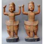 A Pair of South East Asian Carved and Painted Wooden Figures, possibly South China Straits, in