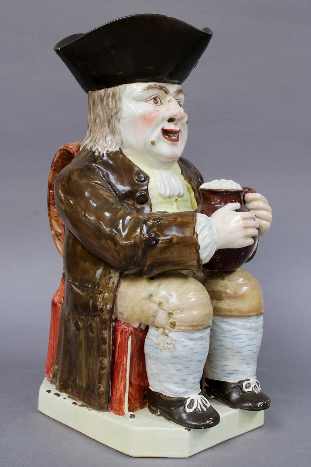 A 19th Century Staffordshire Pottery Toby Jug, of large size, coloured in enamels, 30cm highFrom the