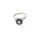 A Sapphire and Diamond Cluster Ring, unmarked, finger size MGross weight 3.6 grams.