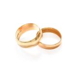 An 18 Carat Gold Band Ring, finger size P1/2; and A 9 Carat Gold Band Ring, finger size O1/29