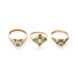 Two 9 Carat Gold Diamond Solitaire Rings, finger sizes K1/2 and M1/2; and A Yellow Sapphire and