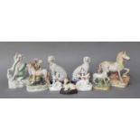 A Collection of 19th Century Staffordshire Models, including horse and foal spill vase, two zebra, a
