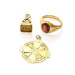 A 9 Carat Gold Seal; A Pendant, stamped 'K18', length 3.3cm; and An Intaglio Ring, unmarked,