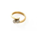 An 18 Carat Gold Diamond Two Stone Twist Ring, the round brilliant cut diamonds, in white claw