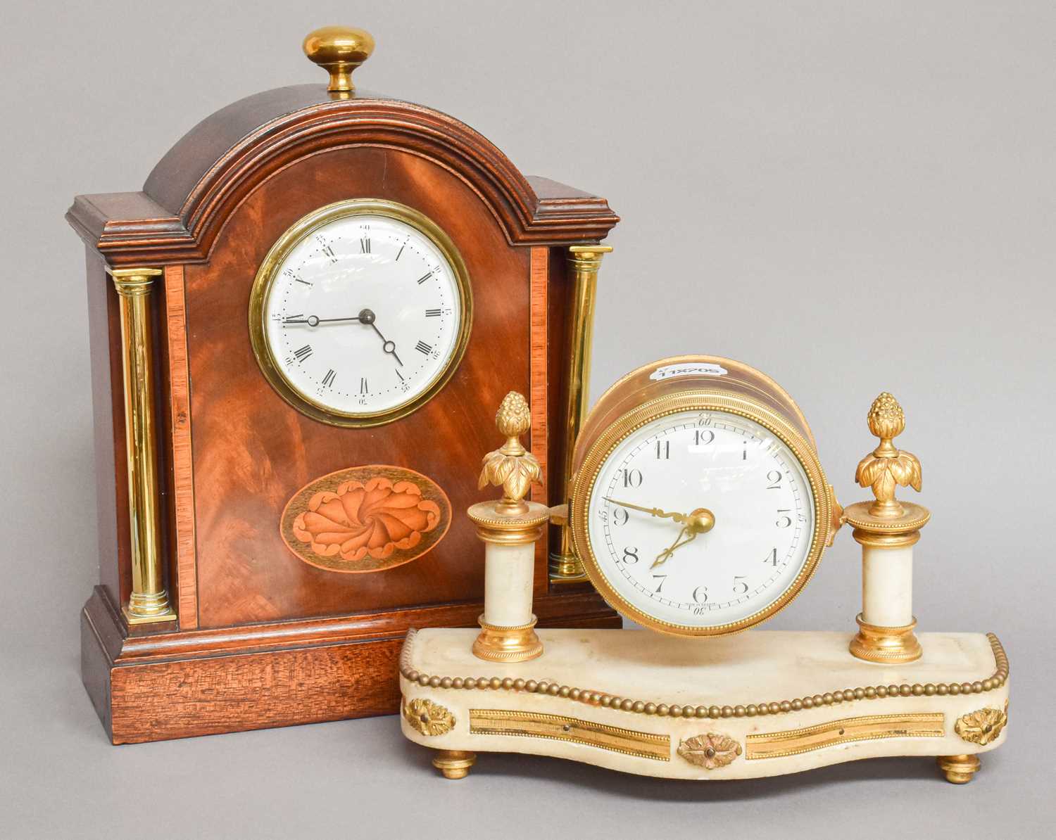 A French Gilt Metal and White Marble Mantel Timepiece, circa 1890, with later battery-driven