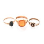 A Cornelian Signet Ring, finger size T; A Bloodstone Intaglio Ring, finger size O1/2; and A Split
