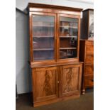 A George III Mahogany Glazed Bookcase, 118cm by 53cm by 208cmWith non-transferable standard ivory