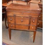 A 19th Century Mahogany Campaign Writing Table, the hinged top fitted with a mirror, 63cm by 47cm by
