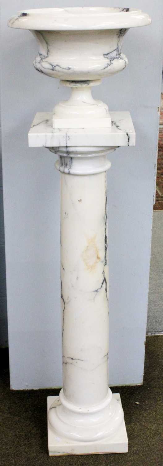 A White and Grey Veined Marble Urn, on column stand in 18th century style, 134cmAppears to be in