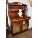 A Victorian Mahogany Chiffonier, with shelved superstructure over a pair of drawers, above a pair of