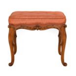 A Victorian Carved Walnut or Beech Framed Dressing Stool, circa 1880, recovered in pink buttoned