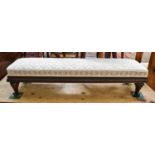 A Victorian Mahogany Footstool, upholstered in cream damask, 109cm by 27cm by 24cmIn generally