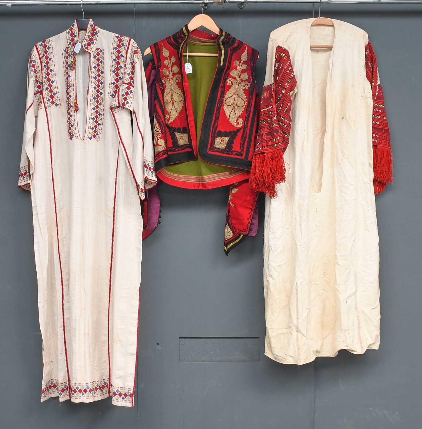 Late 19th/Early 20th Century Ottoman/Albanian Costumes comprising two cream cotton long sleeve robes