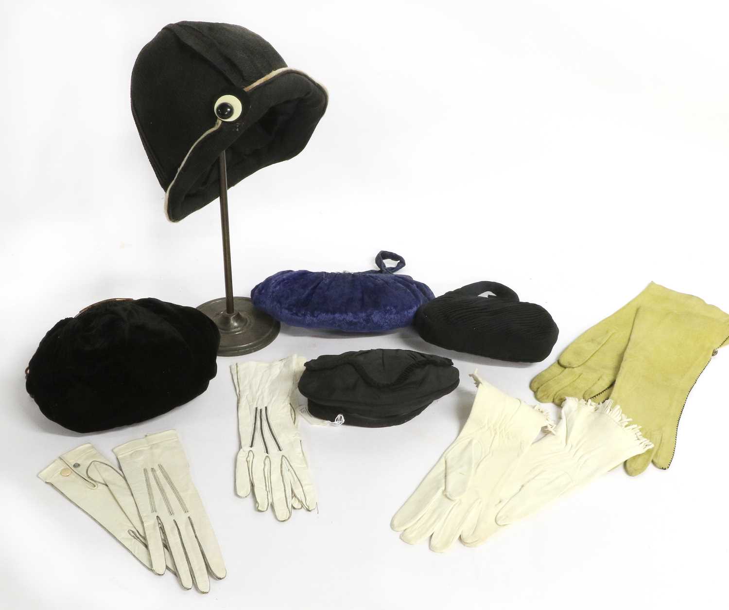 Assorted Early 20th Century Millinery and Costume Accessories, comprising a black silk pleated