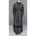 Late 19th Century Black Silk Dress with long tiered sleeves, bead and net lower cuffs, matching