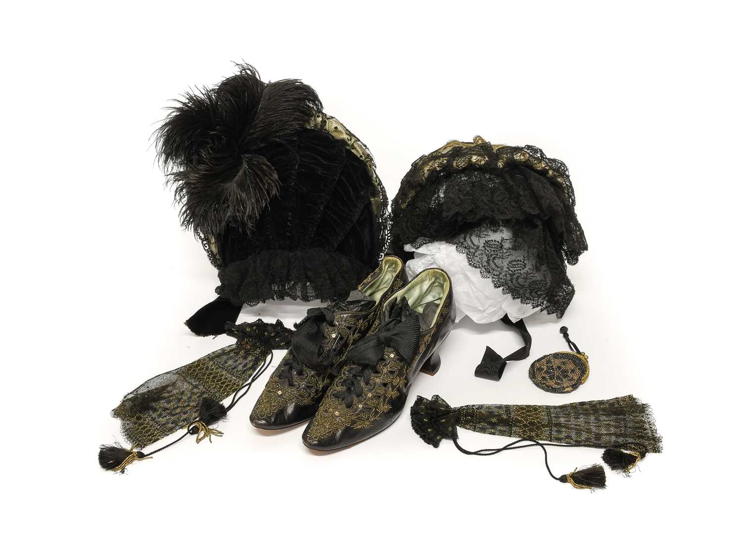 Assorted Late 19th and Early 20th Century Accessories comprising a pair of black leather heeled