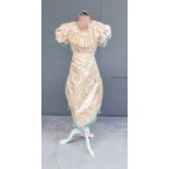 19th Century Cream Silk Brocade Evening Bodice, with short capped sleeves, blue silk tassel